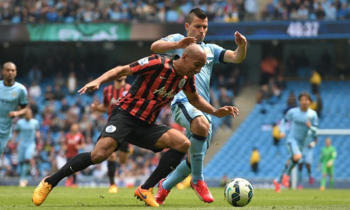 QPR Midfielder Karl Henry与Loftus Road Club延伸合同